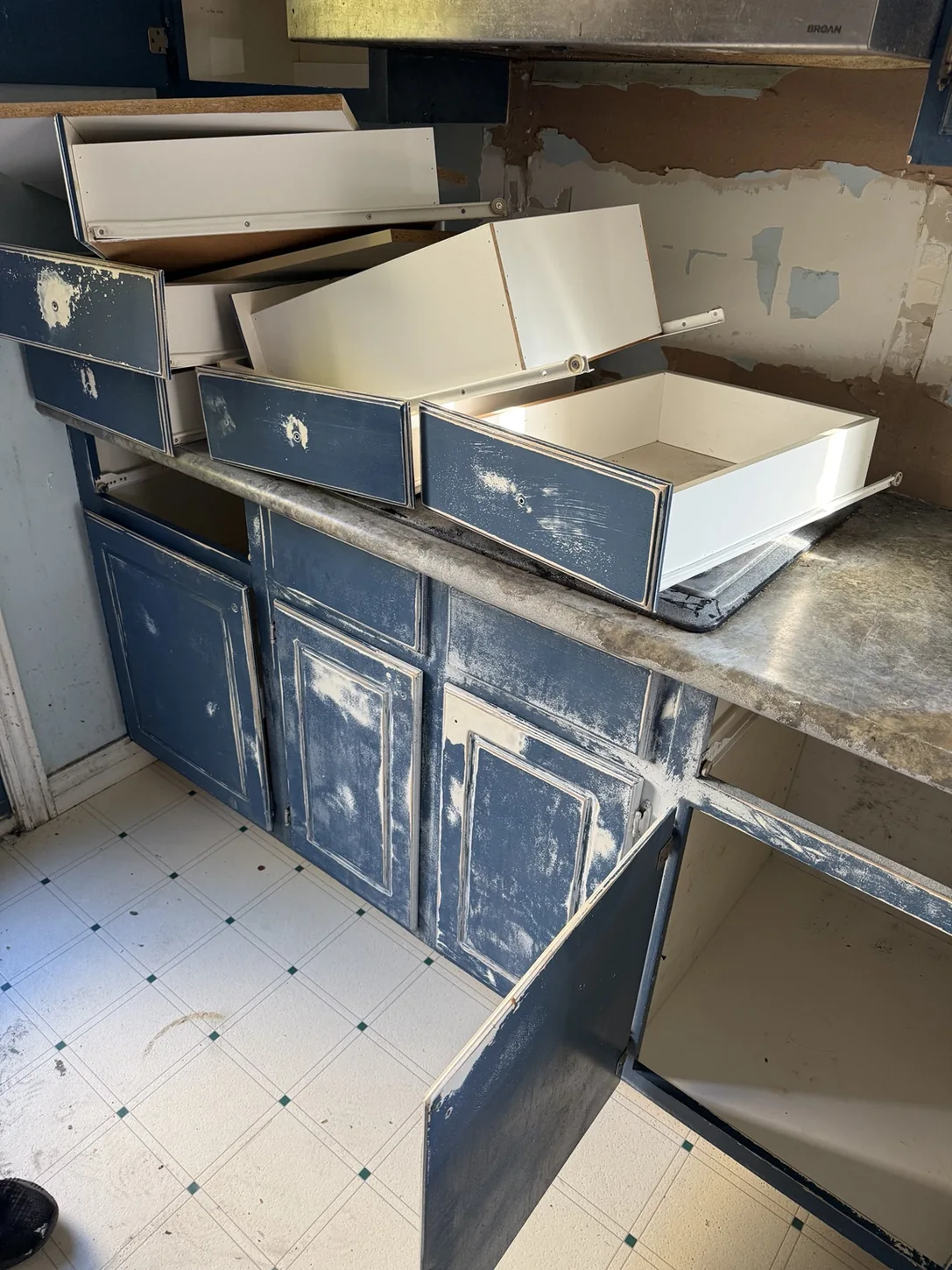 Kitchen cabinet drawers in refinishing stage