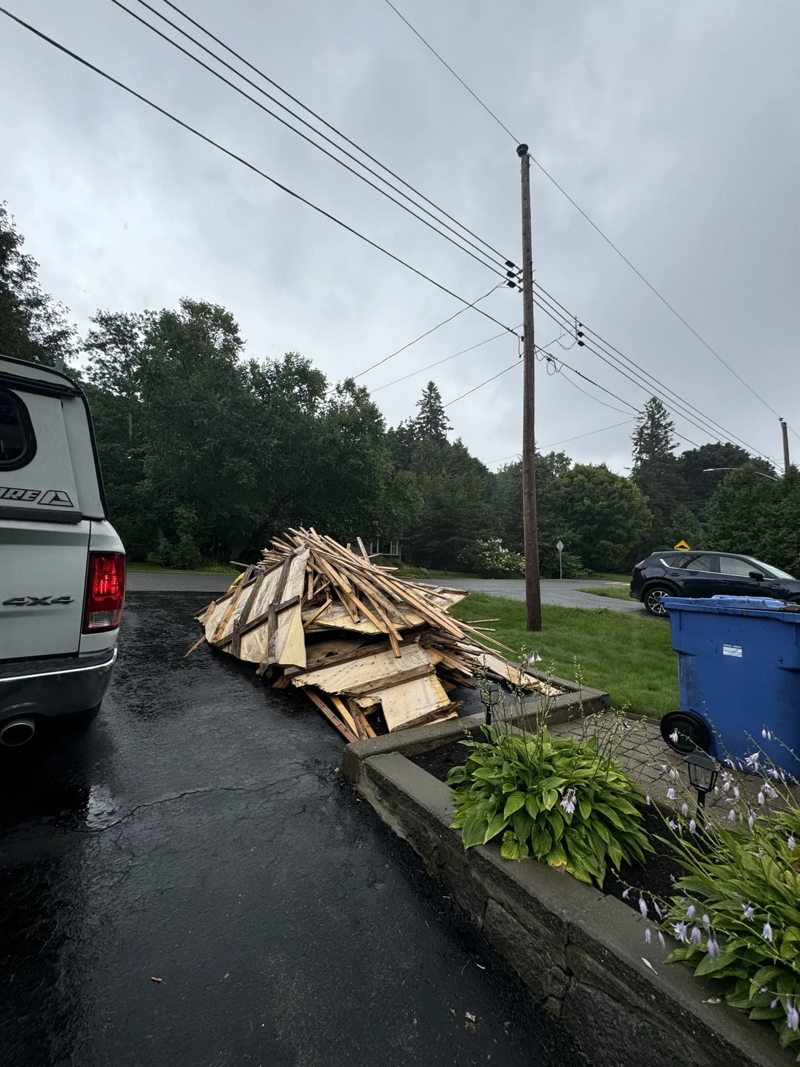 Removed renovation timber collected outside for disposal